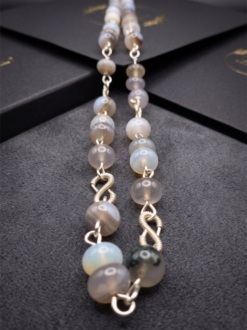 Jelly Botswana agate beaded necklace with natural banding and translucent glow.